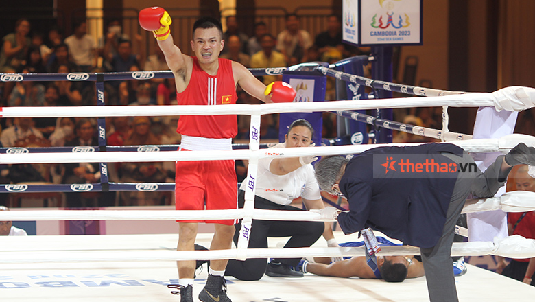 Bùi Phước Tùng hạ knock-out võ sĩ Thái Lan trong trận chung kết Boxing SEA Games 32 - Ảnh 1