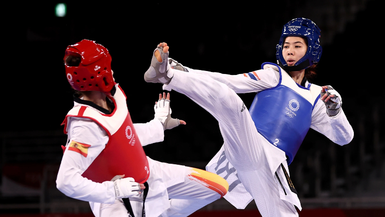 Nữ võ sĩ Taekwondo Thái Lan lại thắng đối thủ Trung Quốc trên sân nhà, giành ngôi vô địch thế giới - Ảnh 1