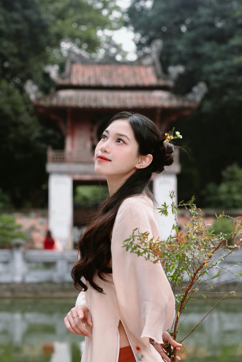 Ngọc nữ bóng chuyền Việt Nam diện áo dài xưa khoe nhan sắc xinh hơn hoa hậu - Ảnh 4