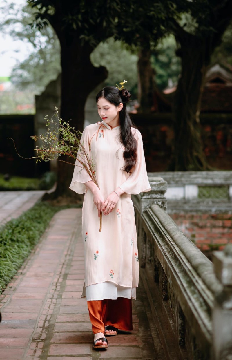 Ngọc nữ bóng chuyền Việt Nam diện áo dài xưa khoe nhan sắc xinh hơn hoa hậu - Ảnh 9