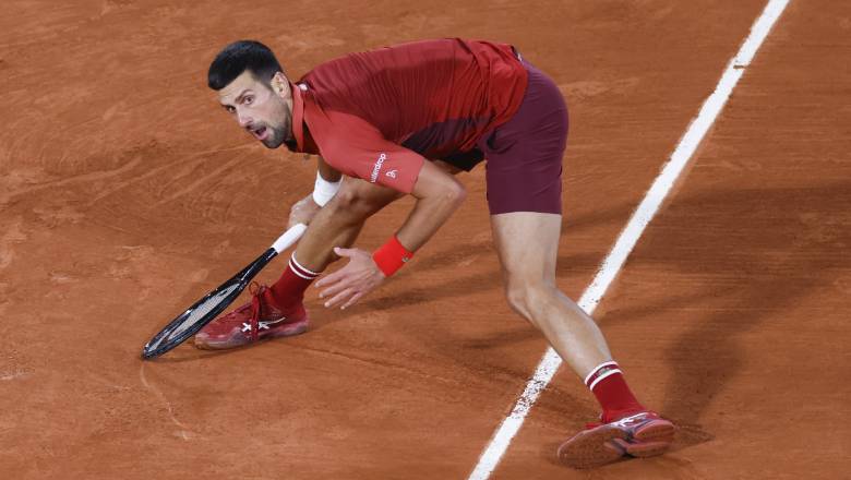 Djokovic vào vòng 4 Roland Garros sau 5 set kịch tính, san bằng kỷ lục của Federer - Ảnh 2