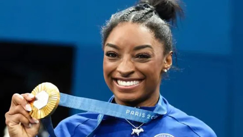 Simone Biles đi vào lịch sử Olympic sau khi giành HCV toàn năng TDDC - Ảnh 1