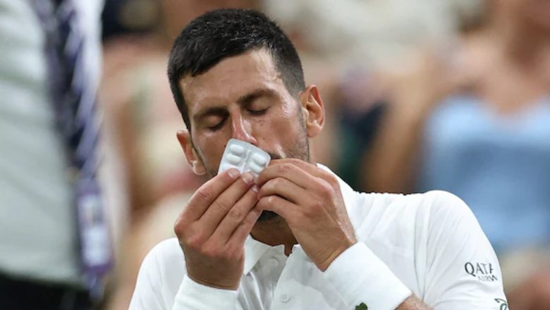 Djokovic phải chăm sóc y tế 2 lần vì đau dạ dày, vẫn vào vòng 2 Wimbledon - Ảnh 1