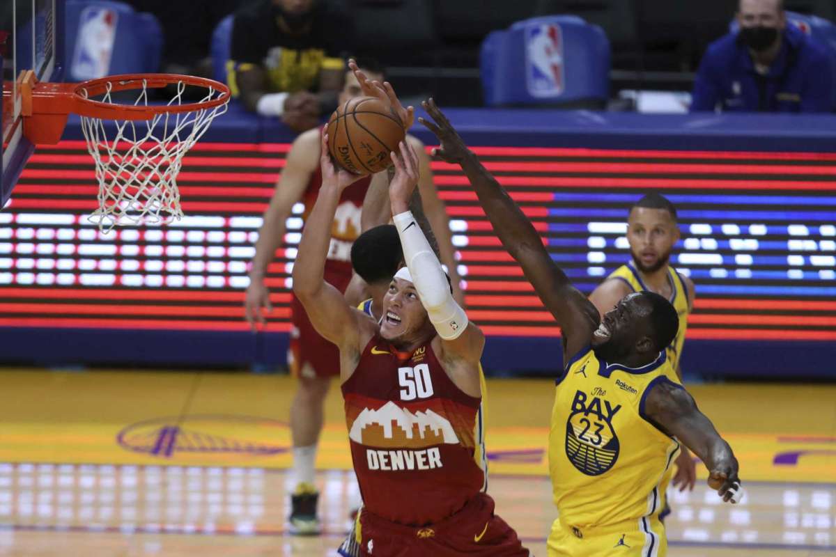 Stephen Curry và Golden State Warriors chào mừng CĐV trở lại với chiến thắng trước Denver Nuggets - Ảnh 1