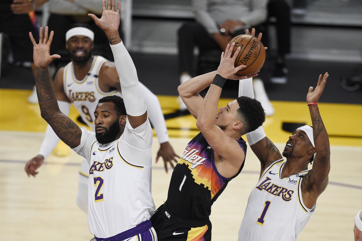 Bất chấp đau đớn, Anthony Davis gồng gánh LA Lakers bám sát Top 6 - Ảnh 5