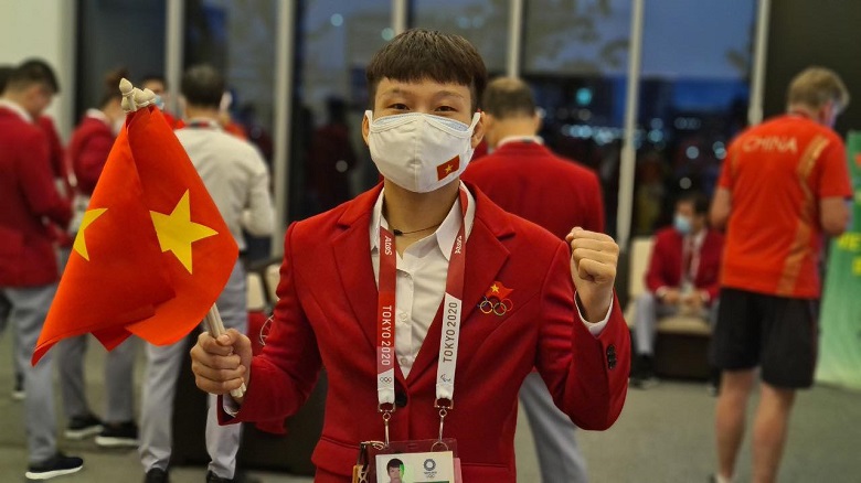 Chùm ảnh: Đoàn thể thao Việt Nam dự lễ khai mại Olympic Tokyo 2021 - Ảnh 3