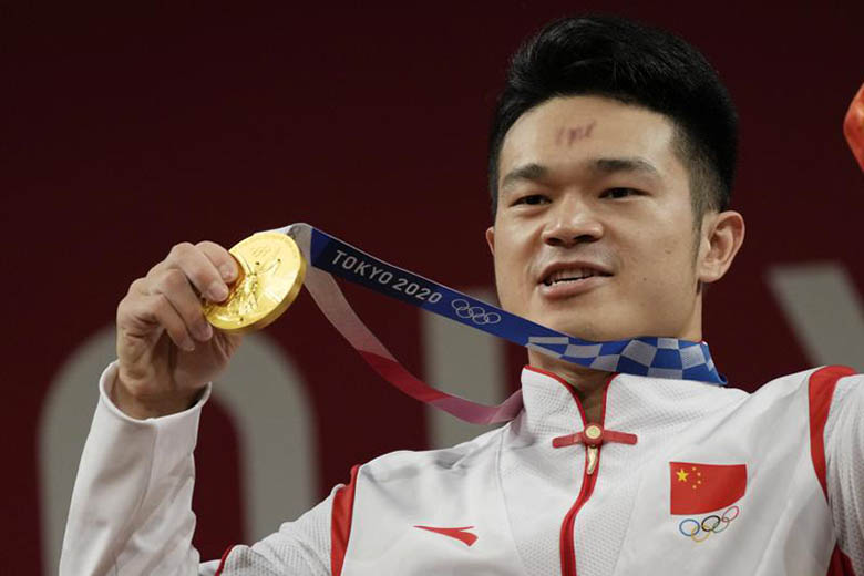 Olympic Tokyo 2021: VĐV cử tạ Trung Quốc cho rằng phá kỷ lục cá nhân thú vụ hơn vô địch Olympic. - Ảnh 2